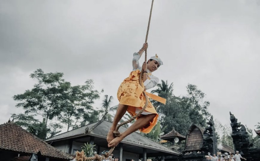 Only Once a Year: The Sacred Rejang Ayunan, Swinging Dancing on the Cempaka Tree in Pupuan Village