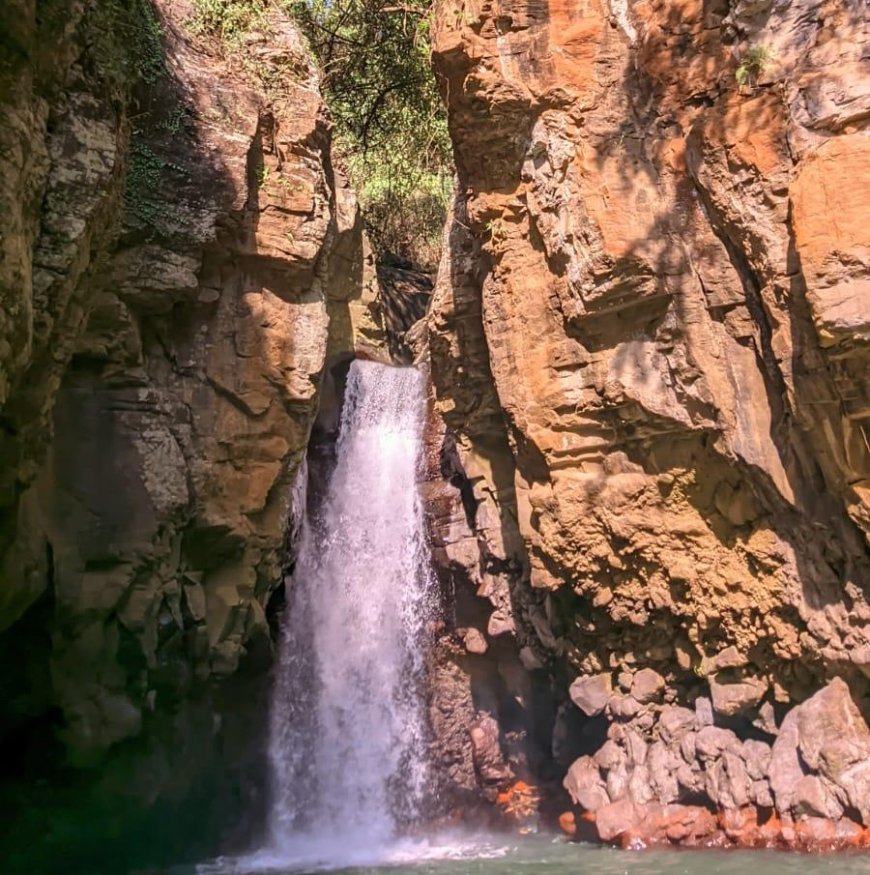 Exploring Tembok Barak Waterfall: The Unique Charm of Red Rock Walls in North Bali