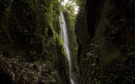 Aan Waterfall: With Green Cliffs and Clear Water Flows