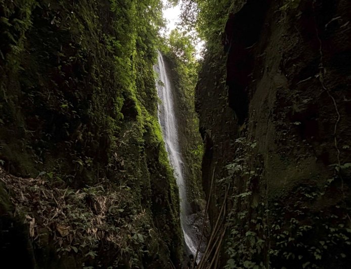 Aan Waterfall: With Green Cliffs and Clear Water Flows