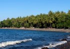 Palisan Beach: The Charm of Sunset Amid Rocks and Coconut Trees
